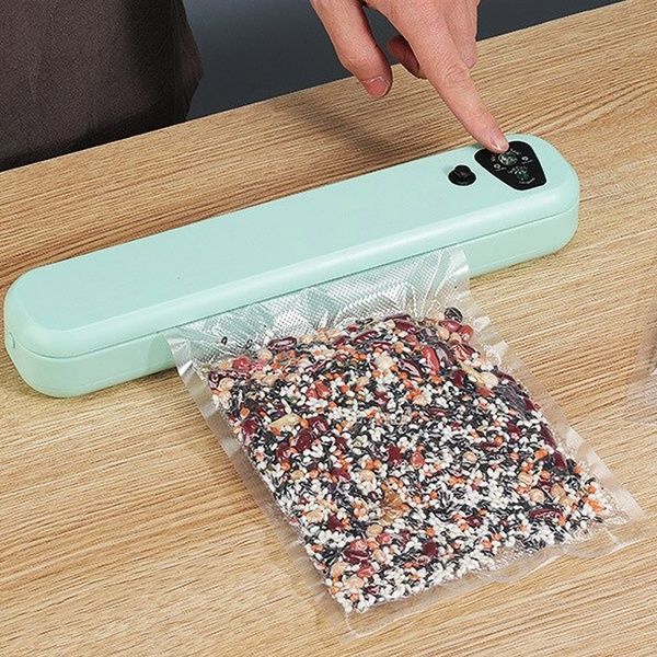 Вакуумный упаковщик продуктов питания Vacuum Sealer / Вакууматор домашний для еды 23456246502 фото